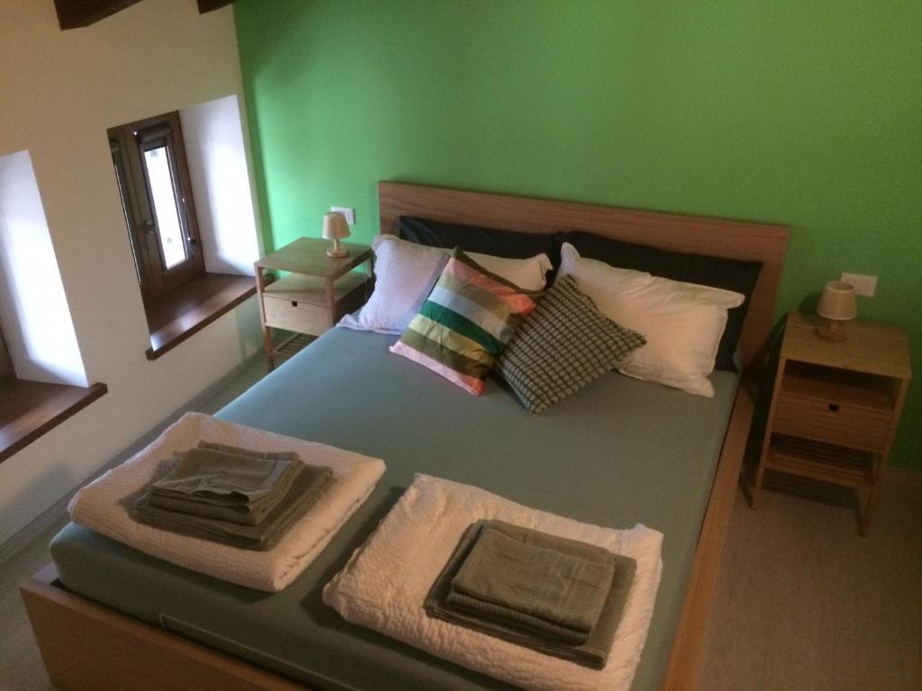 Postel nebo postele na pokoji v ubytování Al Borgo Affittacamere