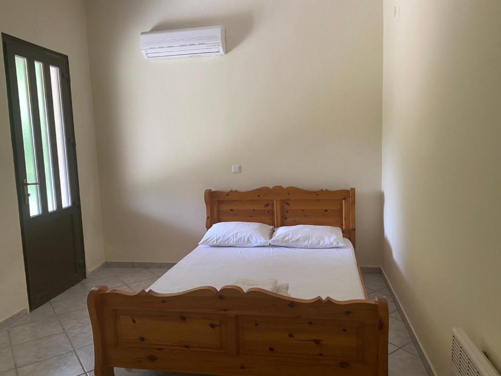 Łóżko lub łóżka w pokoju w obiekcie Villa Dalia