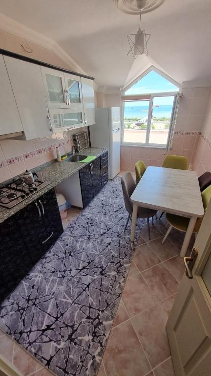 Kuchyň nebo kuchyňský kout v ubytování Zingila Apart
