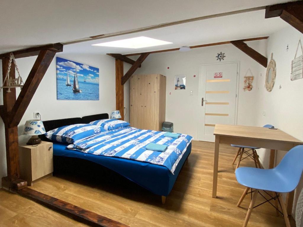 Postel nebo postele na pokoji v ubytování Sea world Apartments Mansarda