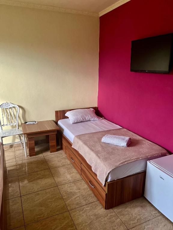Postel nebo postele na pokoji v ubytování Hotel Atika