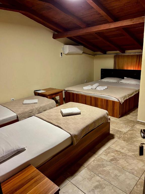 Postel nebo postele na pokoji v ubytování Hotel Atika