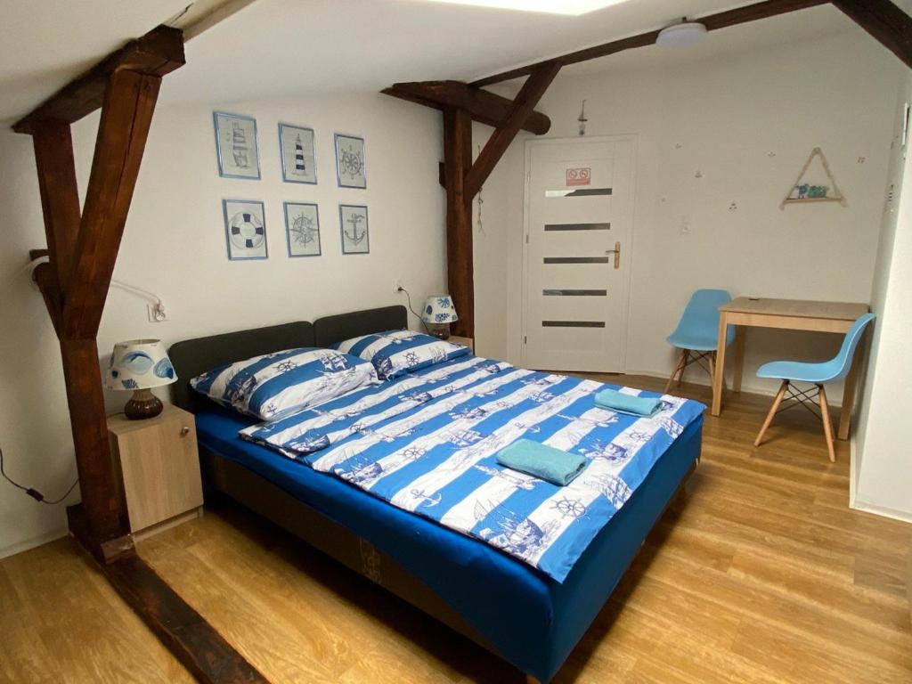 Postel nebo postele na pokoji v ubytování Sea world Apartments Mansarda