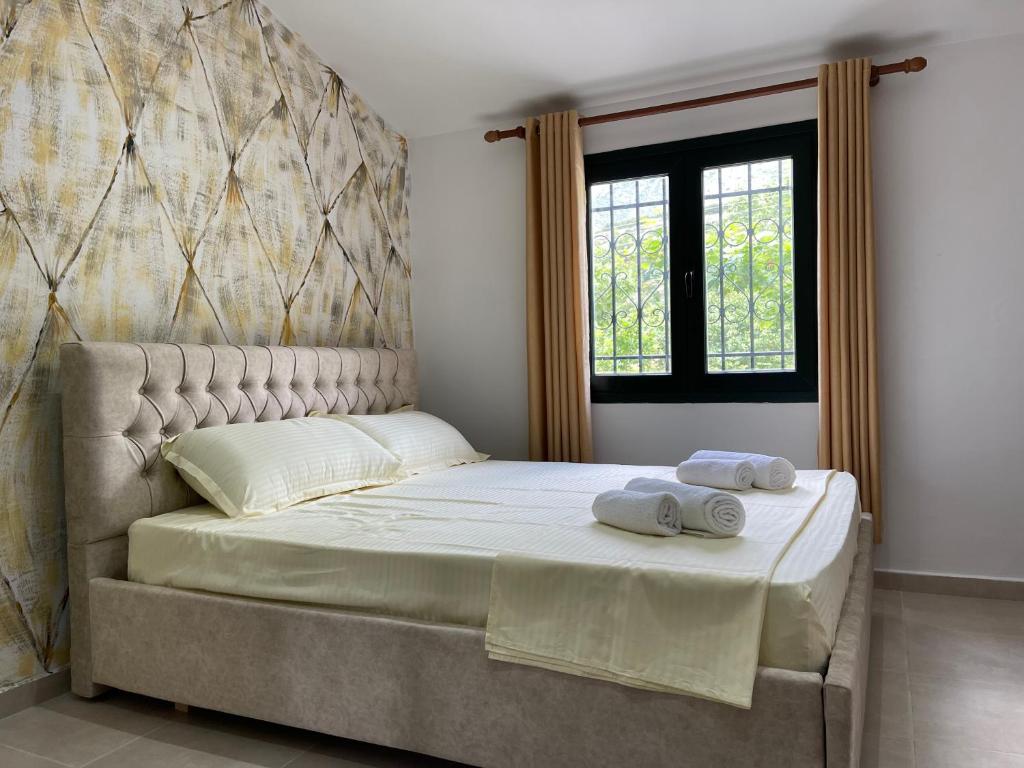 Postel nebo postele na pokoji v ubytování Hibroj Guesthouse