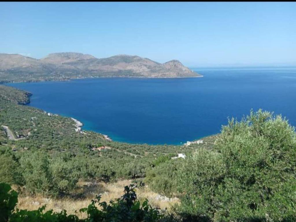 a view of a large body of blue water at Mani Stevi Home in Agriliá