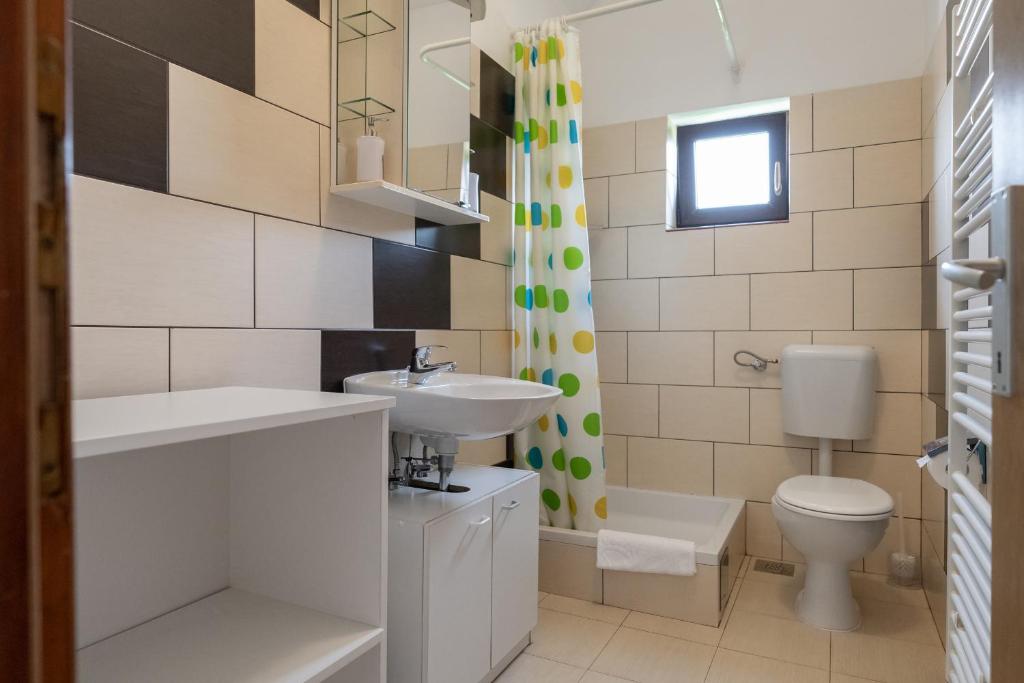Kúpeľňa v ubytovaní Apartments Patar