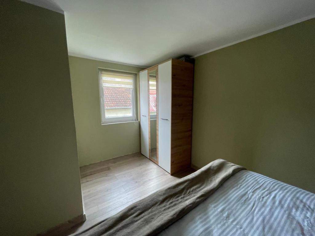 Postel nebo postele na pokoji v ubytování Duplex Oasis Ada