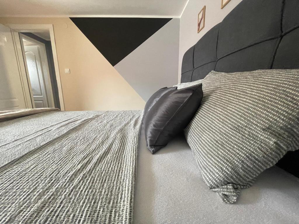 Postel nebo postele na pokoji v ubytování Duplex Oasis Ada