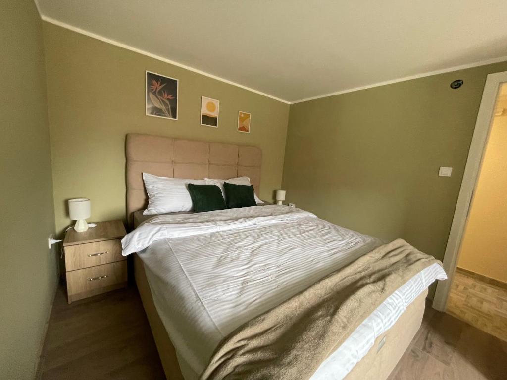 Postel nebo postele na pokoji v ubytování Duplex Oasis Ada