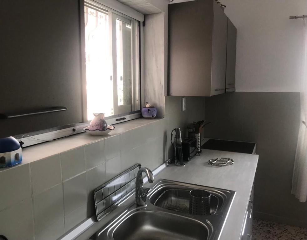 Kuchyň nebo kuchyňský kout v ubytování Tim's House