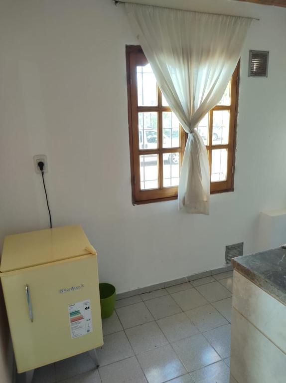 a box in a kitchen with a window at Departamento Payún Matrú in Malargüe