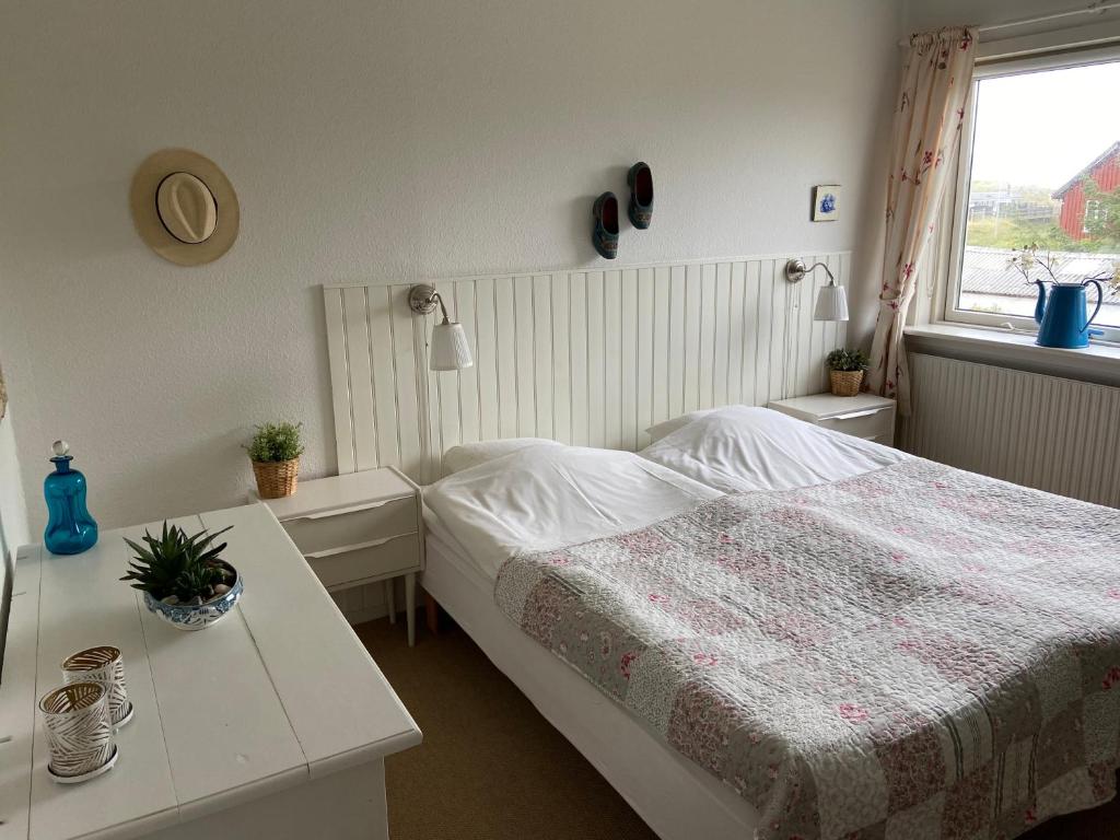 Postel nebo postele na pokoji v ubytování Klithjem Badehotel
