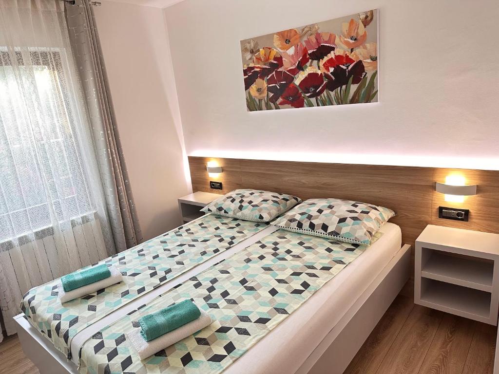 Posteľ alebo postele v izbe v ubytovaní Apartment Pančur