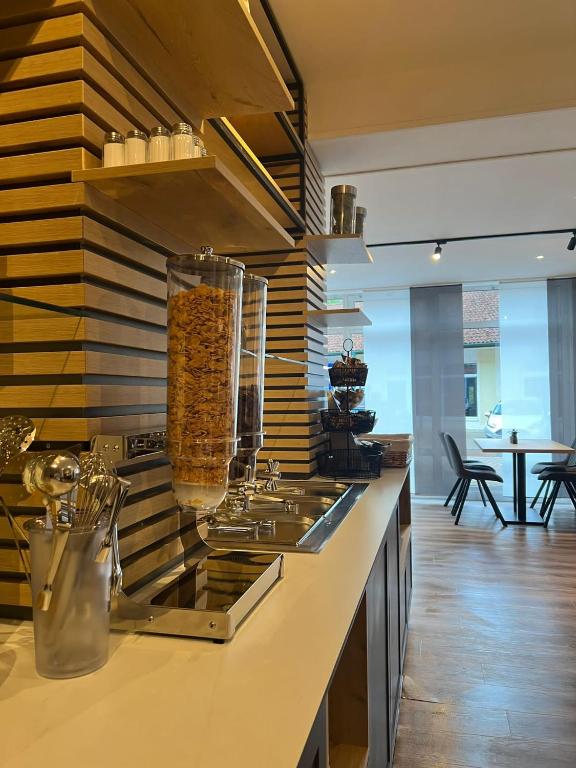 Kuchyň nebo kuchyňský kout v ubytování Hotel Harmshof Bispingen
