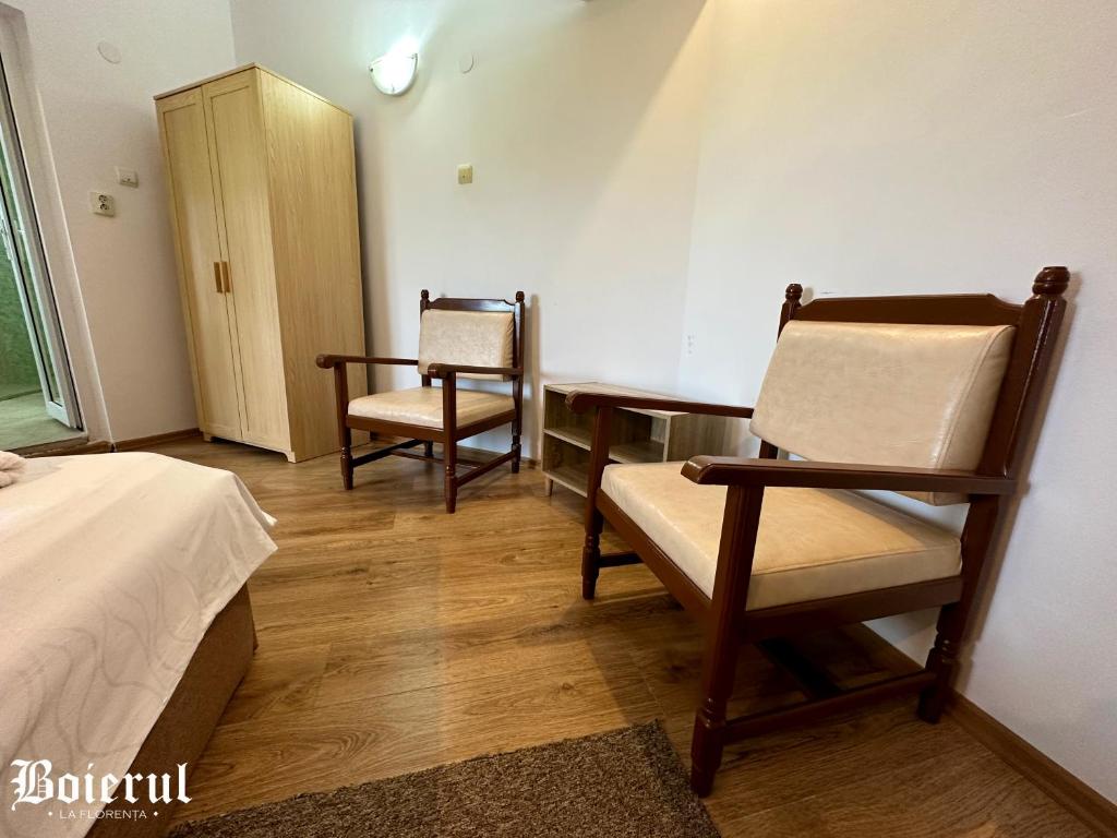 Postel nebo postele na pokoji v ubytování Boierul la Florenta