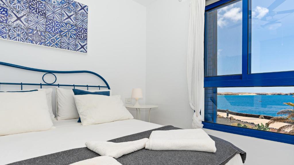 Postel nebo postele na pokoji v ubytování Villa Vista Mar
