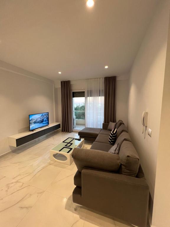 Μια τηλεόραση ή/και κέντρο ψυχαγωγίας στο Mumbas Apartment 1