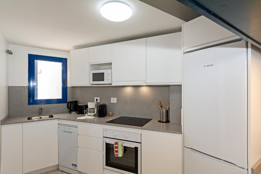 Kuchyň nebo kuchyňský kout v ubytování Villa Vista Mar