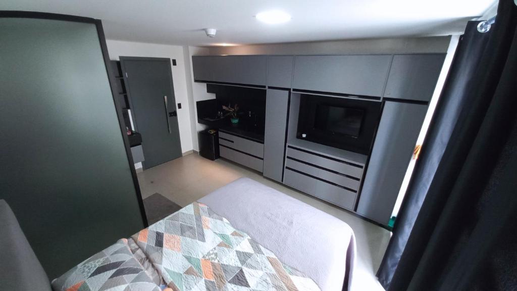 Ένα ή περισσότερα κρεβάτια σε δωμάτιο στο GET ONE - Flat em João Pessoa a poucos passos do mar