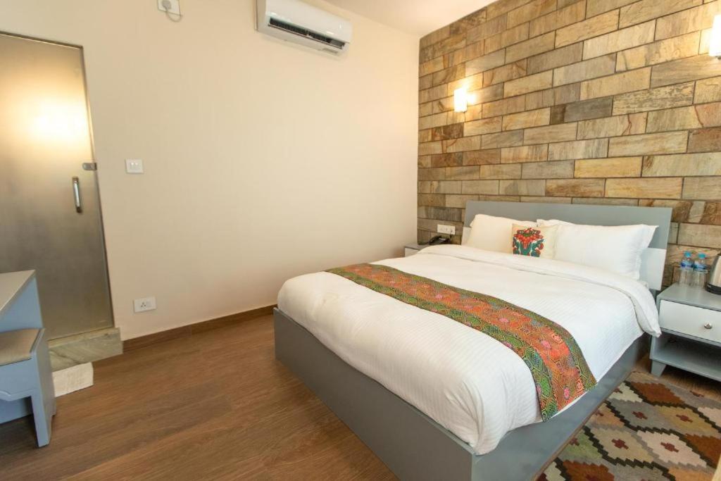 Postel nebo postele na pokoji v ubytování Pata Inn
