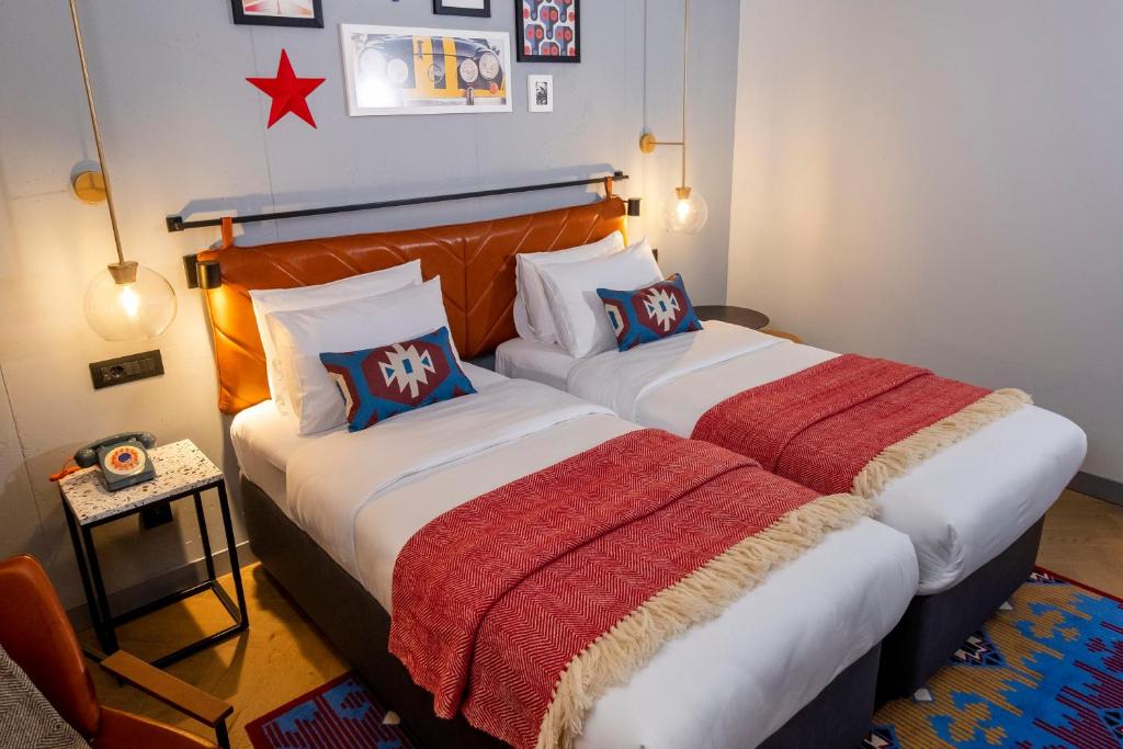 Postel nebo postele na pokoji v ubytování Hotel Indigo Belgrade by IHG
