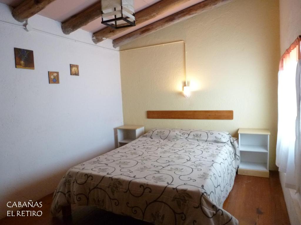 Postel nebo postele na pokoji v ubytování Cabañas El Retiro, un rincón en la montaña