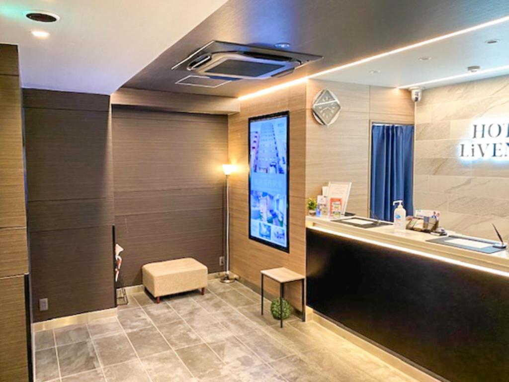 TV a/nebo společenská místnost v ubytování HOTEL LiVEMAX Tokyo Kanda EAST