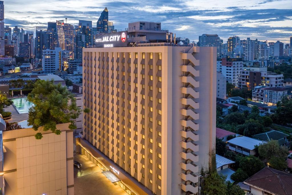 a view of a building with a city in the background at Hotel JAL City Bangkok in Bangkok