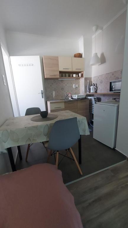 Kuchyň nebo kuchyňský kout v ubytování Scala Studio Apartments