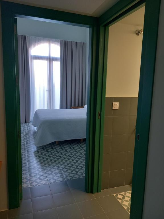 Postel nebo postele na pokoji v ubytování TORREMOCHA