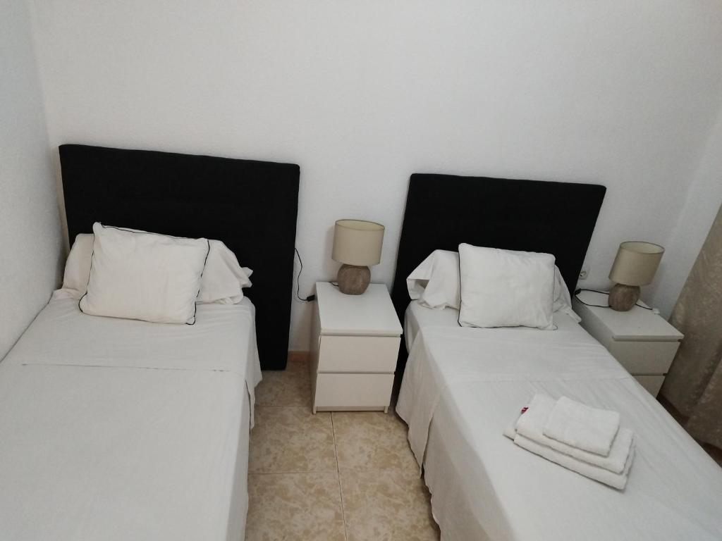 Postel nebo postele na pokoji v ubytování City apartment