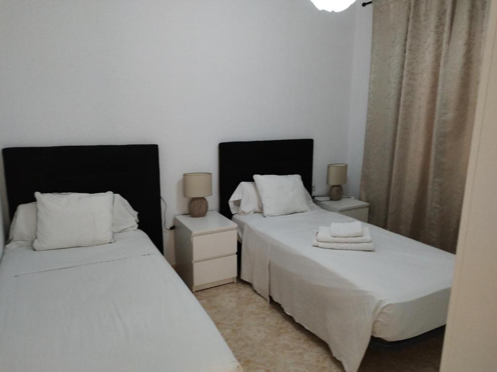 Postel nebo postele na pokoji v ubytování City apartment