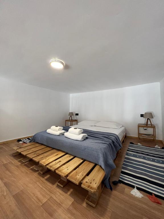 Posteľ alebo postele v izbe v ubytovaní Cozy loft-Close to the sea