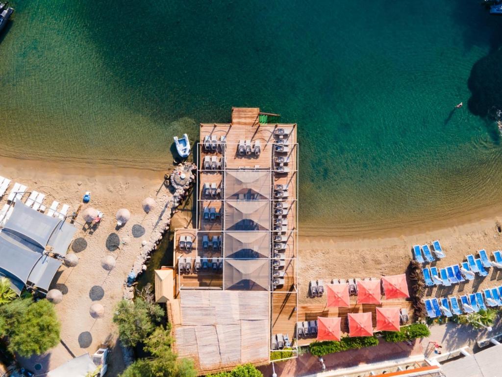 an aerial view of a hotel on the beach at Palm Hills Bodrum Hotel in Bodrum City