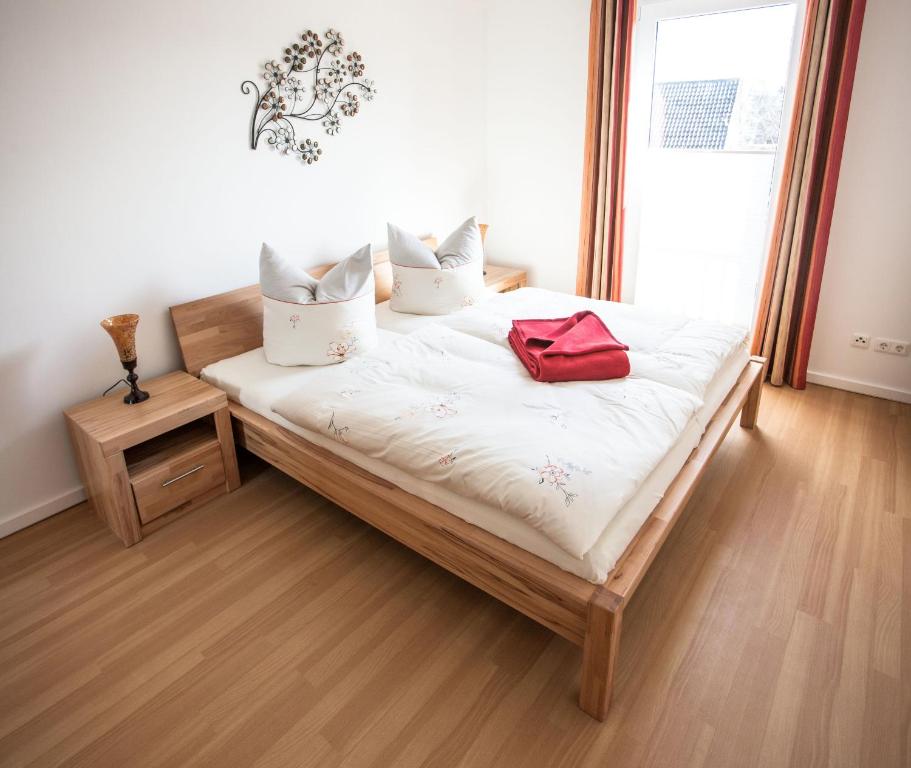 Giường trong phòng chung tại Ferienwohnung Sandstrand