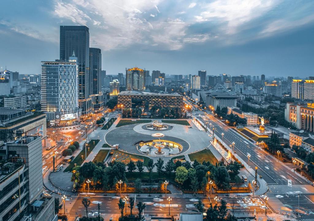 a view of a city with a fountain in the middle at Crowne Plaza Chengdu City Center by IHG in Chengdu
