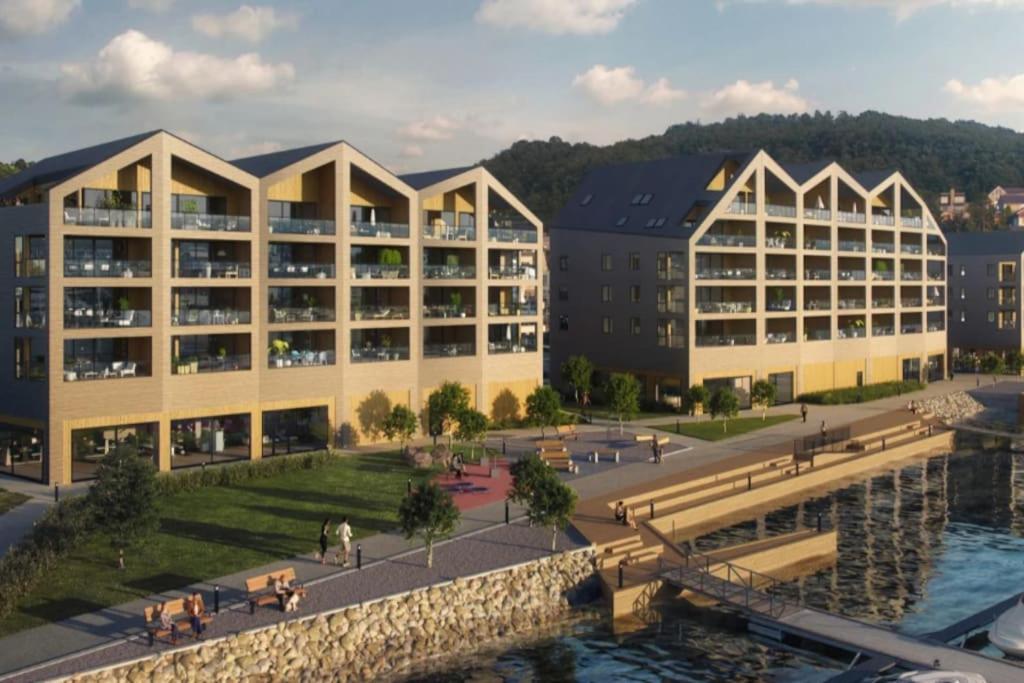 an architectural rendering of a campus with buildings at Nydelig perle rett ved fjorden in Sandnes