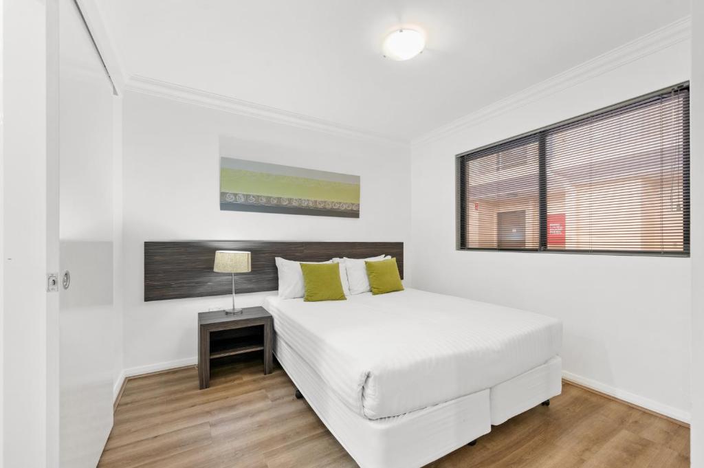 Postel nebo postele na pokoji v ubytování Dolphin Quay Apartments