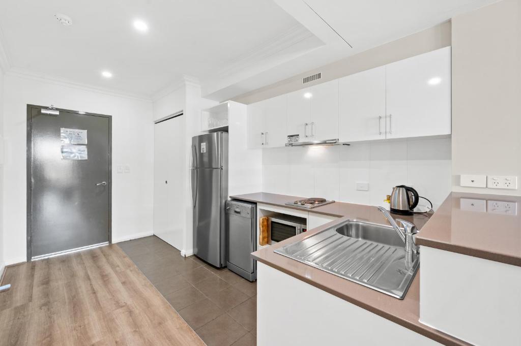 Kuchyň nebo kuchyňský kout v ubytování Dolphin Quay Apartments