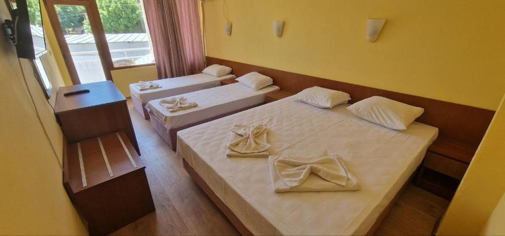 Postel nebo postele na pokoji v ubytování Complex Dobrudja
