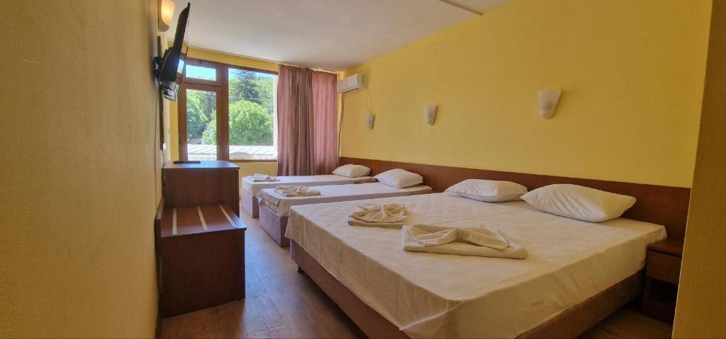 Postel nebo postele na pokoji v ubytování Complex Dobrudja