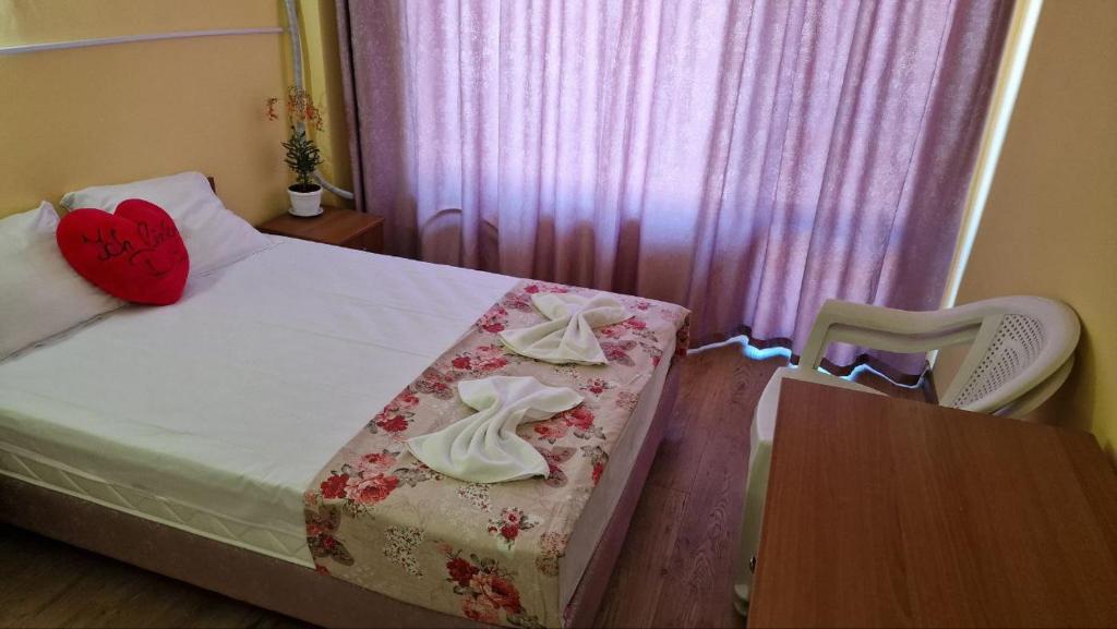 Postel nebo postele na pokoji v ubytování Complex Dobrudja