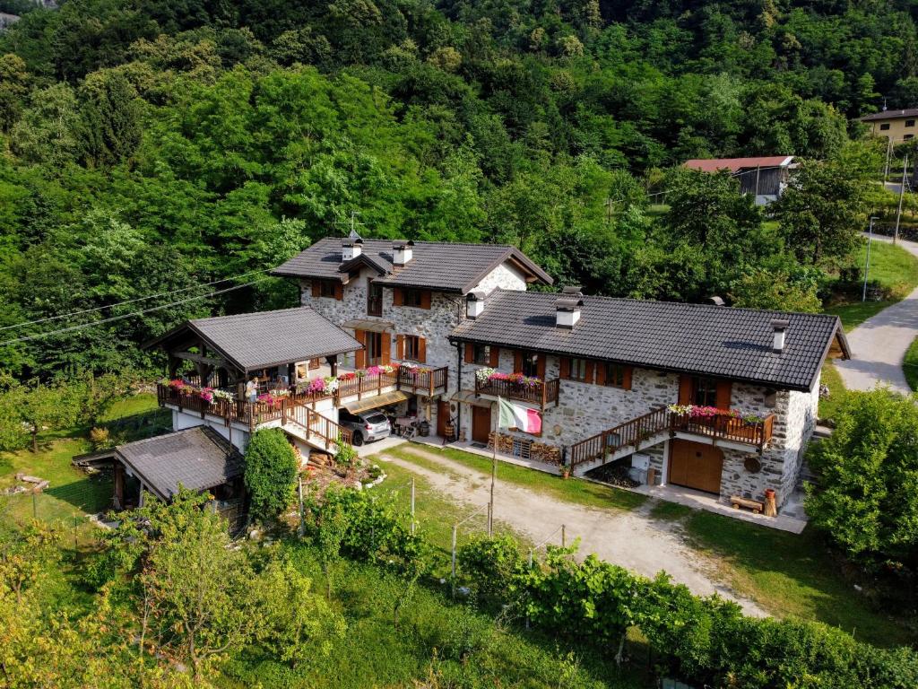 an aerial view of a house in the woods at Maso Daü in Marter di Roncegno