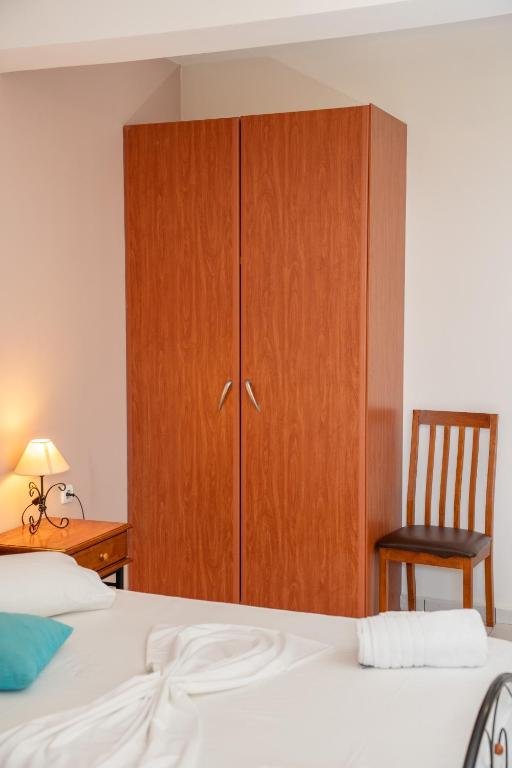 Postel nebo postele na pokoji v ubytování Agnanti Studios