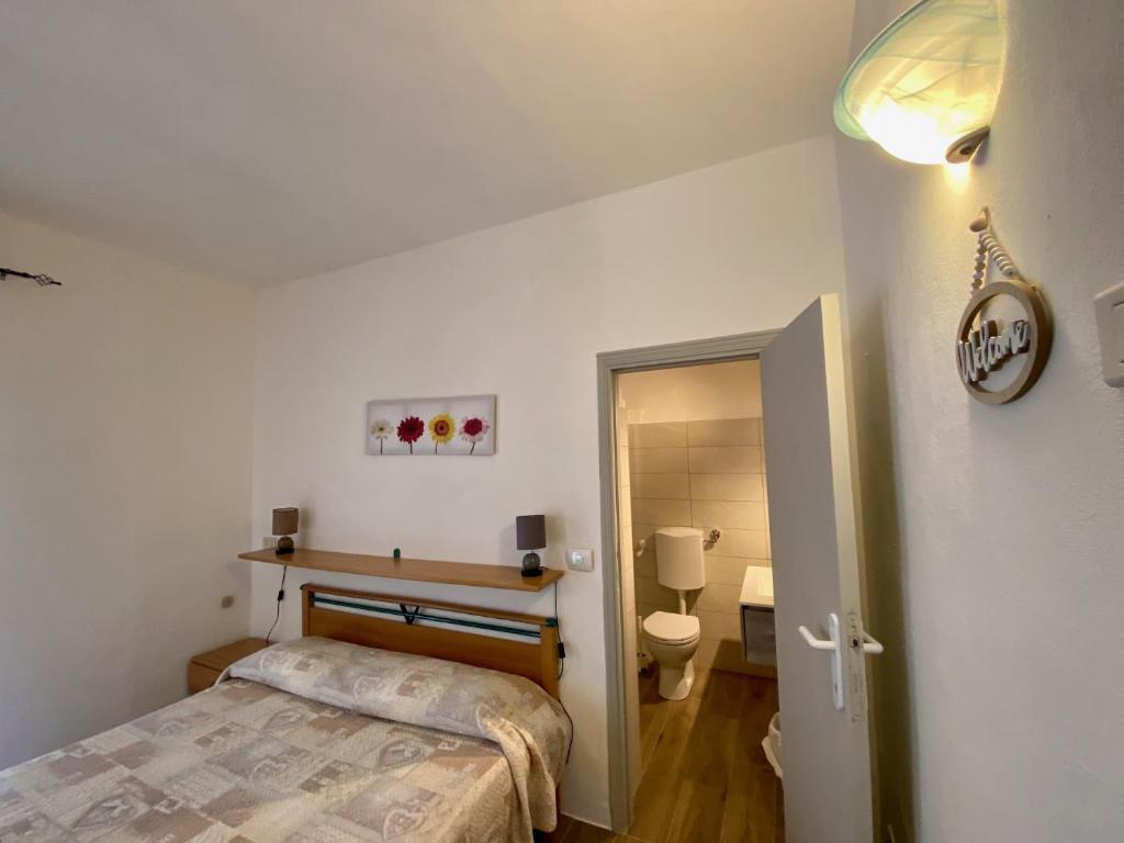 Postel nebo postele na pokoji v ubytování Bed & Breakfast Alex