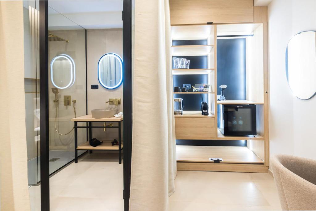 Koupelna v ubytování Tonio Rooms