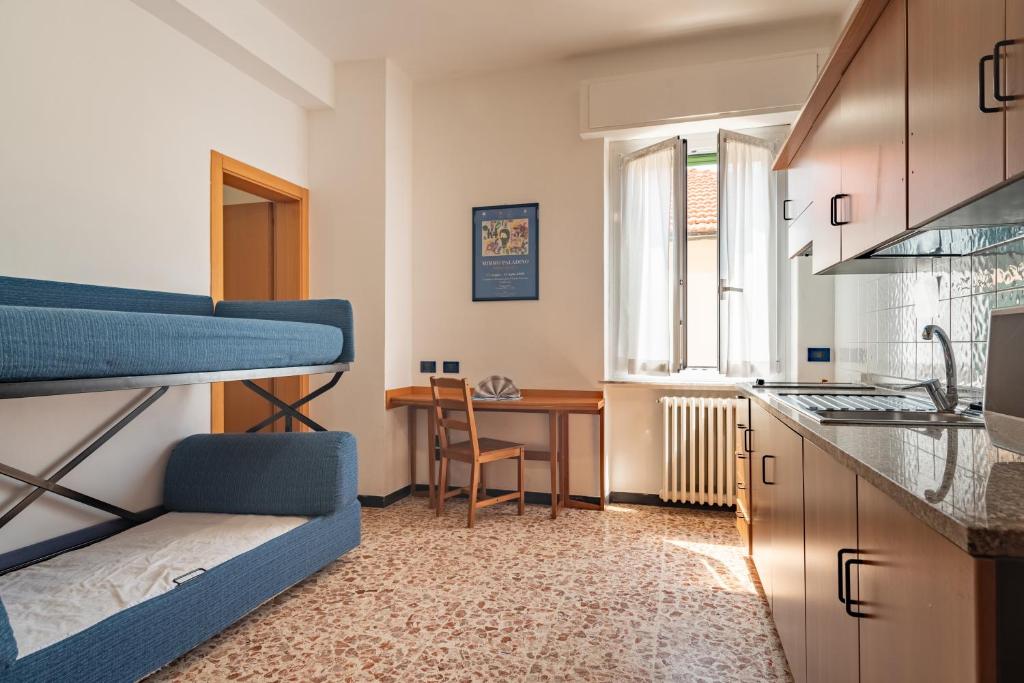 Kuchyň nebo kuchyňský kout v ubytování Residenza Adelaide