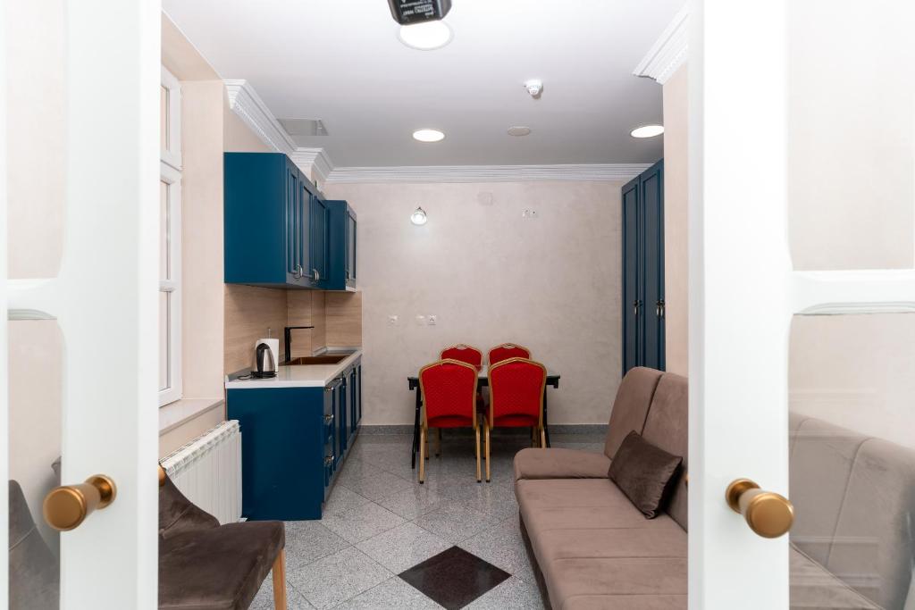 Kuchyň nebo kuchyňský kout v ubytování Ornament Hotel