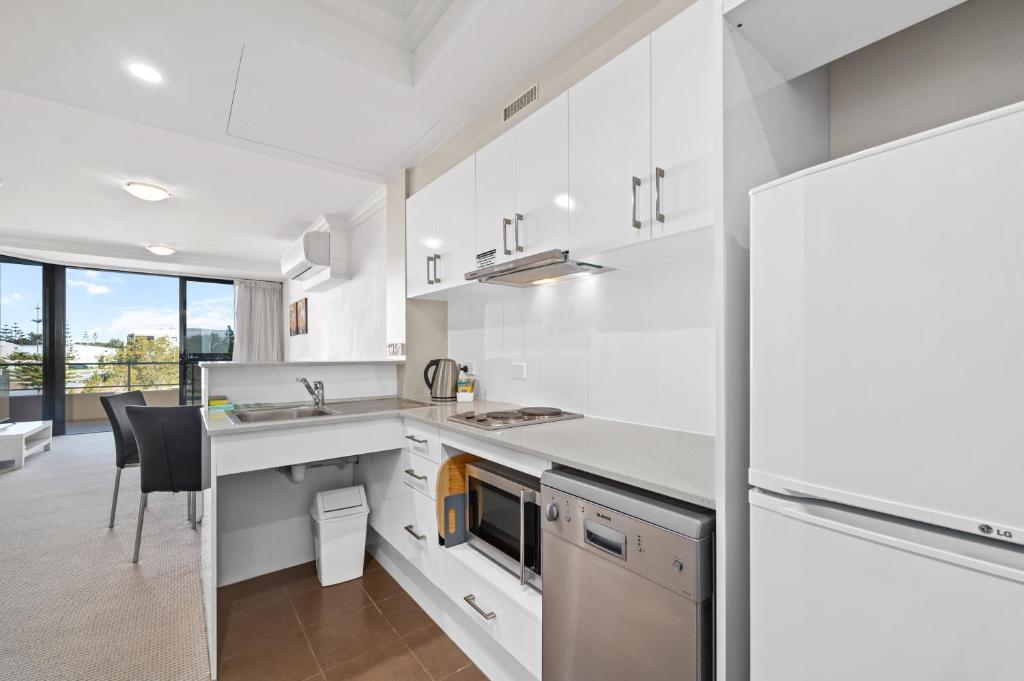 Kuchyň nebo kuchyňský kout v ubytování Dolphin Quay Apartments
