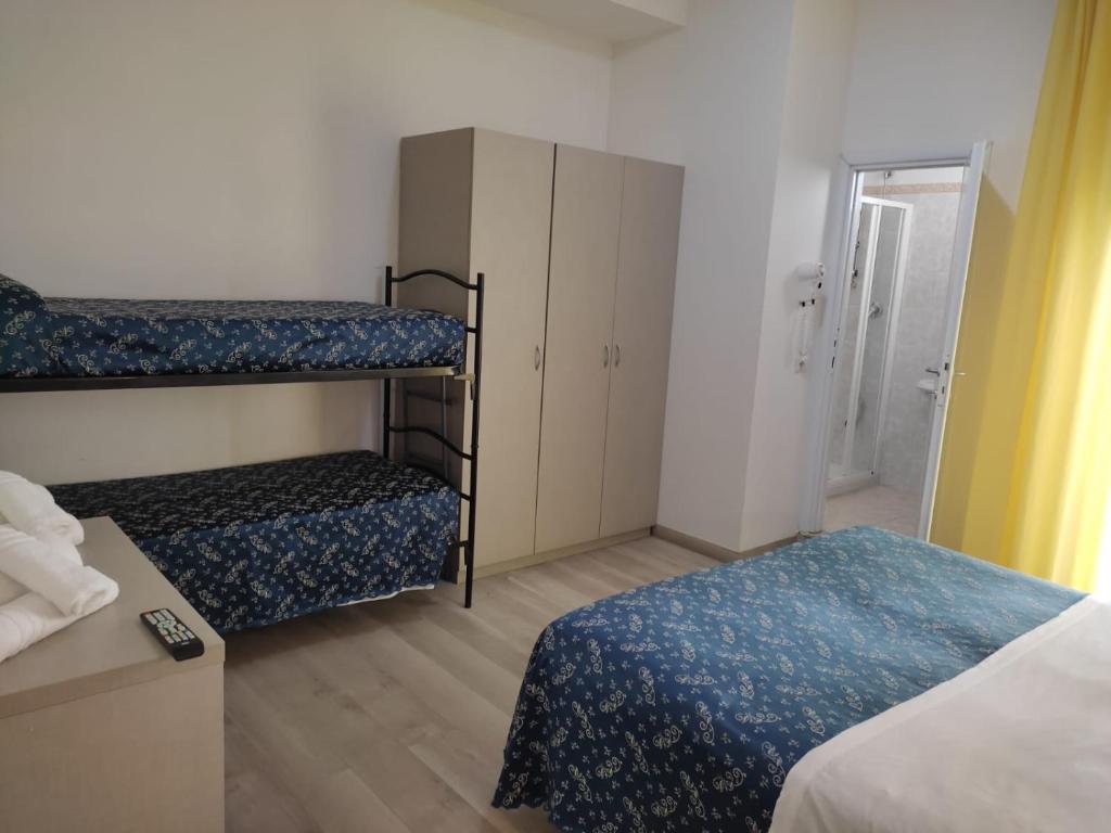 Postel nebo postele na pokoji v ubytování Hotel Sissi